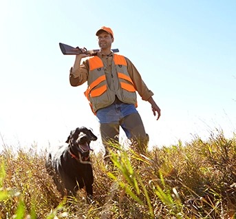 Man going hunting with dog