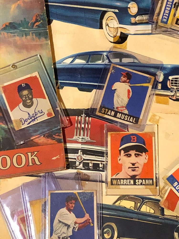 This scrapbook contained a Jackie Robinson 1949 Bowman rookie card